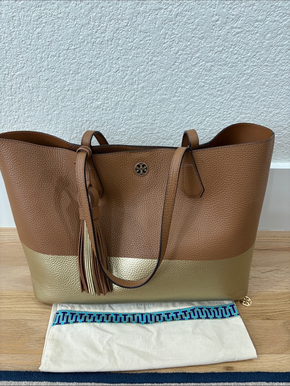 Tory Burch Tan and Gold Two-Tone Pebbled Leather Tote with Tassel